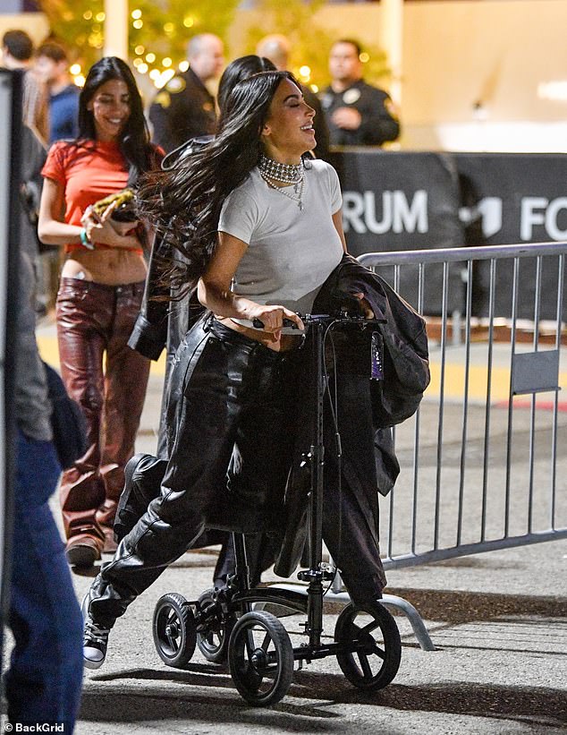 Kim laughed as she spun around on the scooter followed by her friends as they returned to their car driven by their driver.