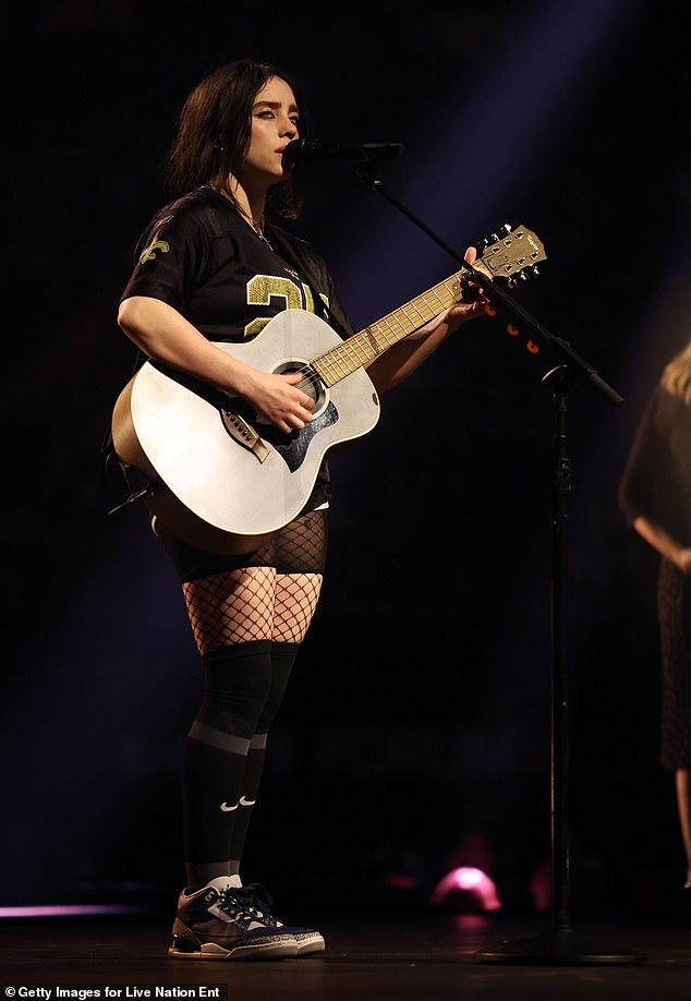 Billie photographed on stage in California. The singer has performed several nights at The Kia Forum with her Hit Me Hard And Soft: The Tour