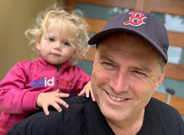 Harper (pictured with her father) was born in May 2020 at Sydney's North Shore Private Hospital.