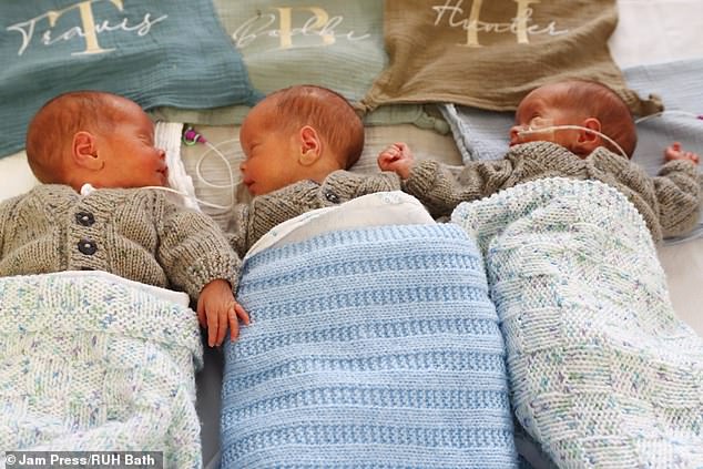 The triplets, named Hunter, Bodhi and Travis, were conceived naturally by the couple.