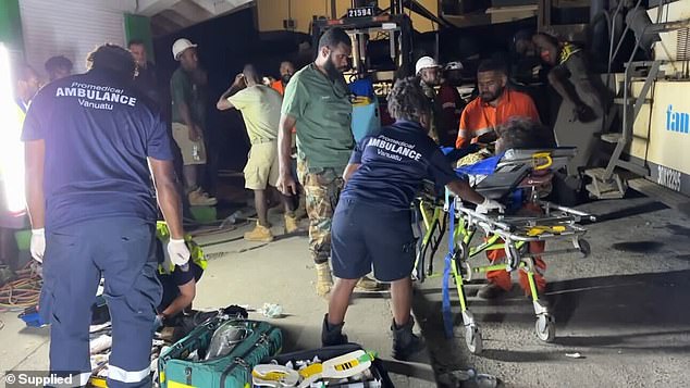 Rescuers pulled out a local woman who was found alive after being trapped under the rubble.