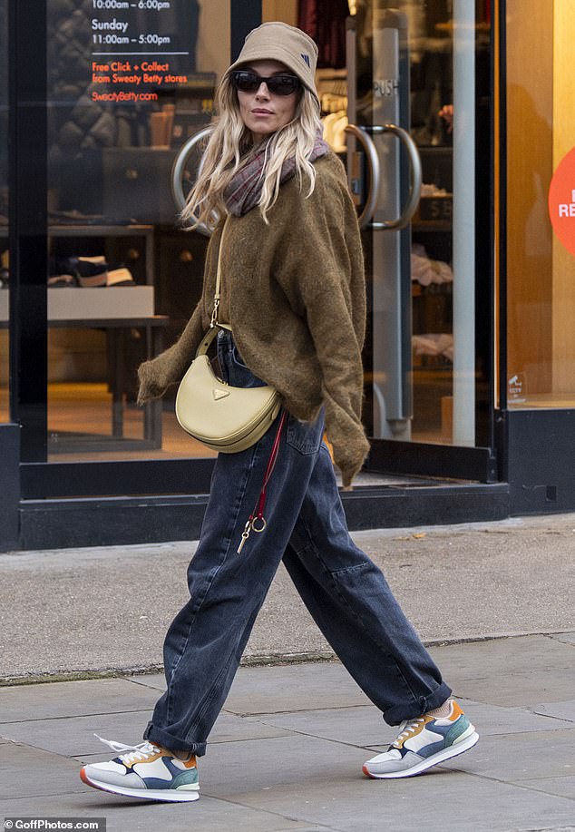 Mum-of-two Sienna tried to keep a low-key appearance as she wandered around town wearing dark-rimmed sunglasses.