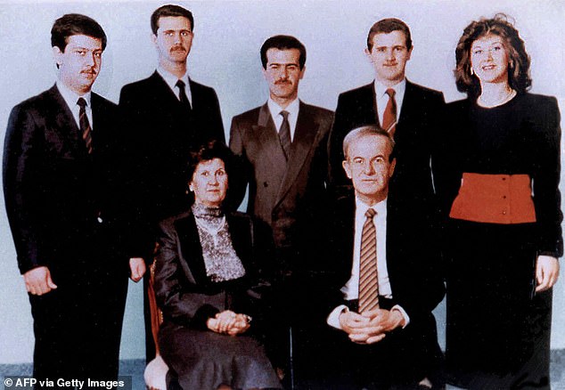 Maher (left) was the youngest son of former Syrian president Hafez al-Assad. The family appears in the photo in 1985.