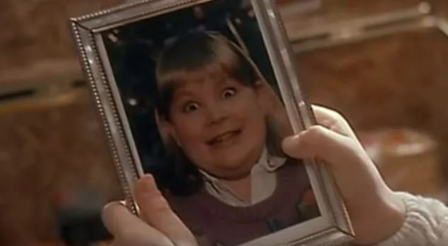 There's a scene where Kevin takes a framed photo of his older brother's girlfriend and sarcastically says 'Buzz, your girlfriend: wow!'