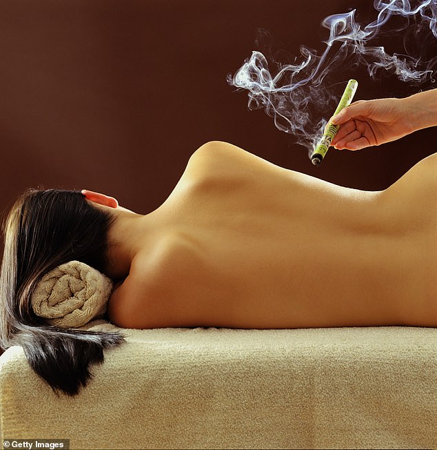 Moxibustion is a traditional Chinese medicine treatment that involves burning a dried herb called 