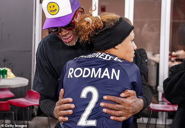 Washington Spirit forward Trinity Rodman (2) with her father Dennis after a 2021 playoff game