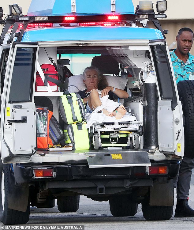 Ambulances and stretches carried the woman to the stairs of the air ambulance as it departed Fiji and landed in Australia.