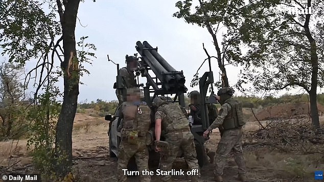 Footage shows Ukrainian soldiers running around a vehicle and loading missiles into the launcher, before taking cover a few meters away and firing two rockets in quick succession.