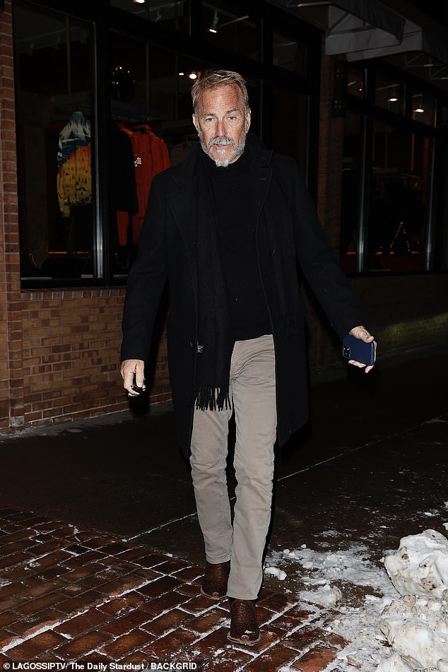 The star looked dapper in a black coat and chinos ahead of Christmas in Colorado.