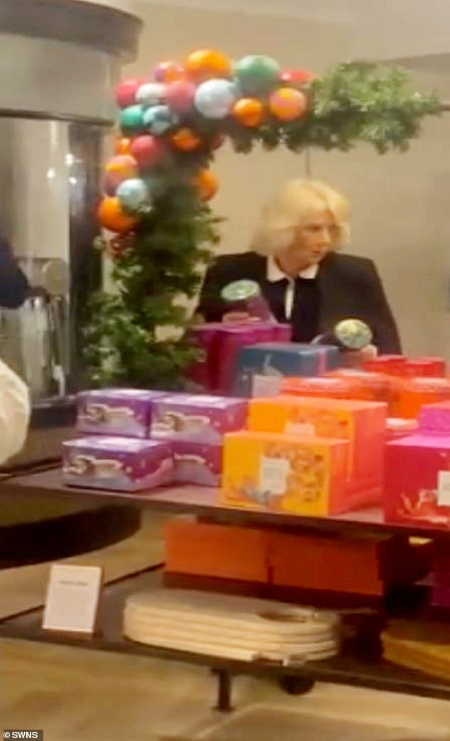 Shoppers were shocked when they saw Camilla leafing through tins of festive tea.