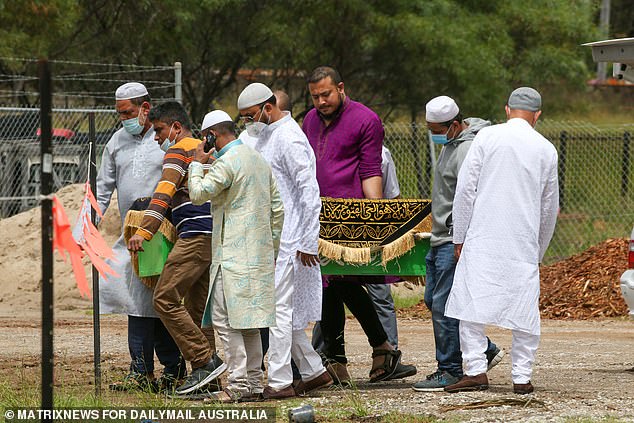 Mourners carry Arnima Hayat's coffin to her grave in the Muslim section of Rookwood Cemetery on February 8, 2022.