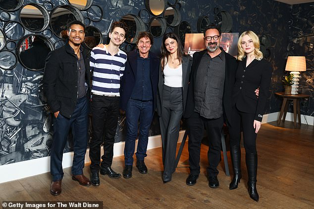 They also posed for group photos with the rest of the cast, including Monica Barbaro, Elle Fanning and director James Mangold; (From left to right) Greg Tarzan Davis, Chalamet, Cruise, Barbaro, Mangold and Fanning