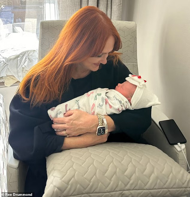 Ree shared a touching image of herself cradling her 'perfect' newborn granddaughter and, just below, she revealed the baby's name.