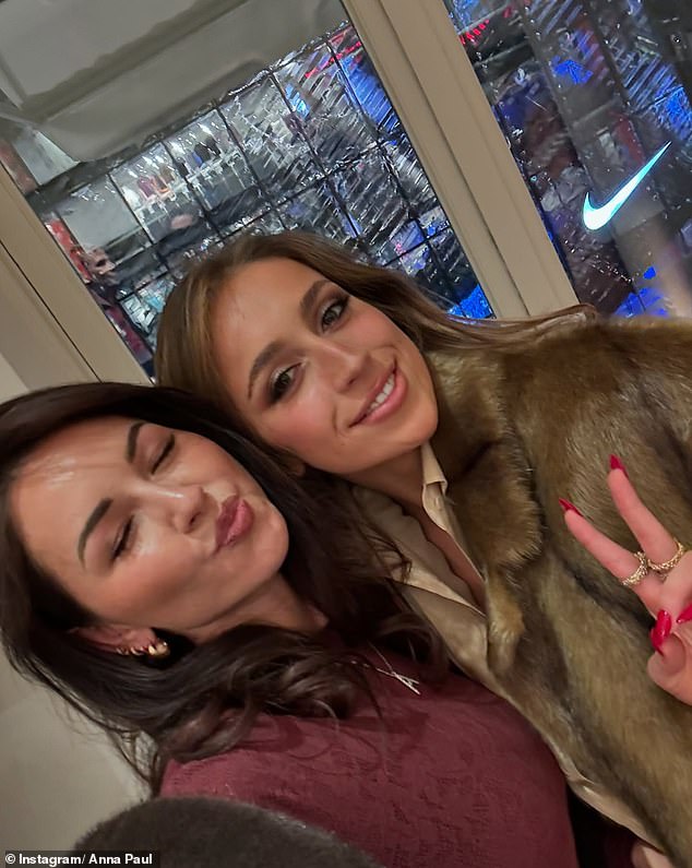 She also shared a cheeky selfie with Canadian pop star Tate McRae, who wore a collared shirt and brown fur coat while flashing a peace sign alongside Anna. Both in the photo