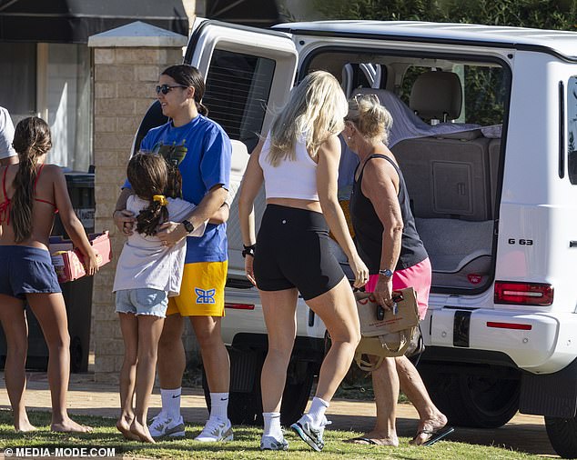 Sam's extended family warmly hugged the Matildas star as the couple arrived at his family home in Perth.