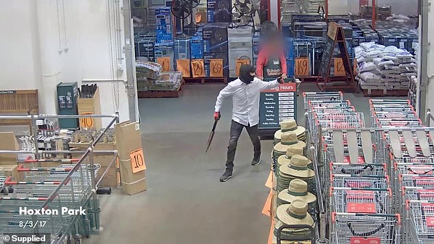 In images released by Bunnings, a man wearing a balaclava appeared to threaten store staff.