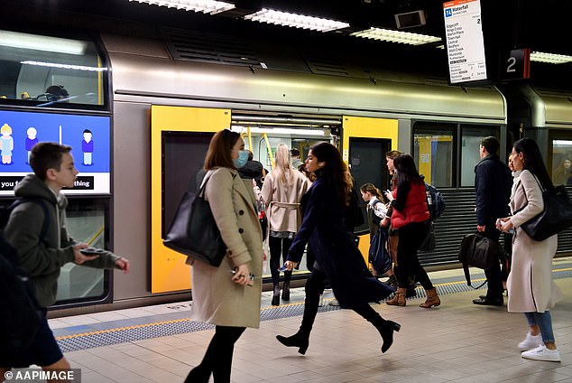 Commuters (pictured center) have been urged to check transportation websites and apps to monitor updates on network disruptions.