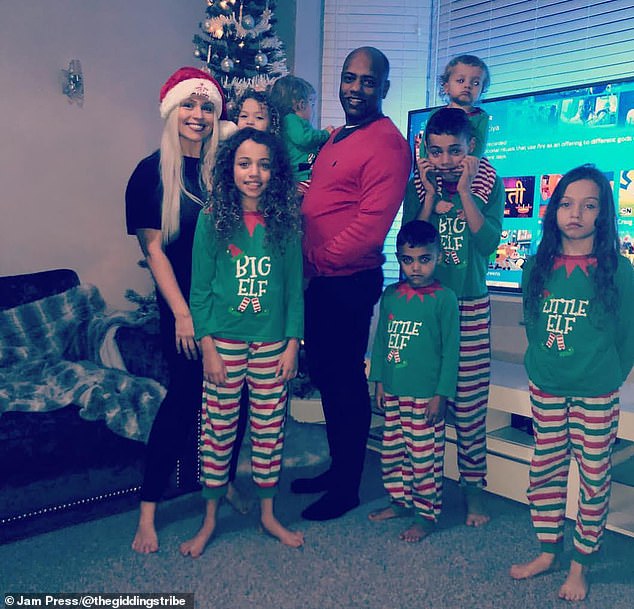 Tess with her husband, Christopher, their children, Jacob, Savannah, Amiah, Zion, Nevaeh and the twins.