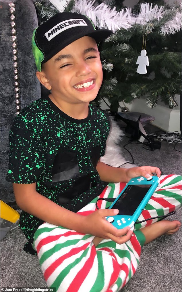 Zion playing with his Nintendo Switch bought for £50 on Facebook Marketplace