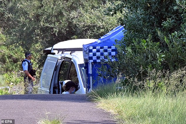 Police are investigating two suspects who fled abroad following the couple's gruesome death. Pictured is the crime scene on Tuesday after Mr. Chen's body was found.