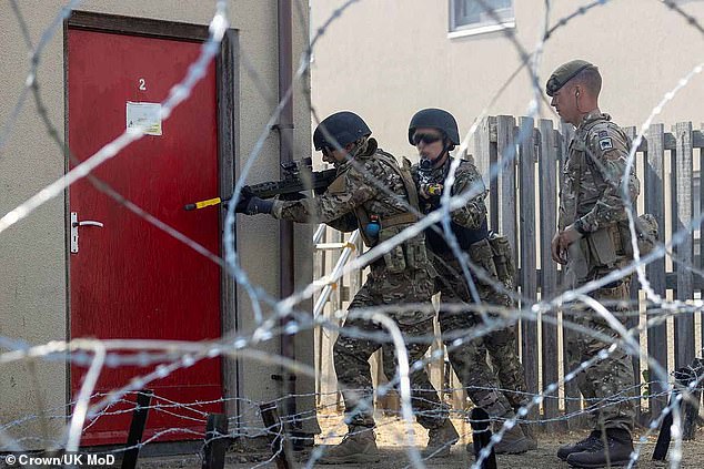 Ukrainian soldiers put their new skills into practice, storming a building while a British Army instructor looks on.