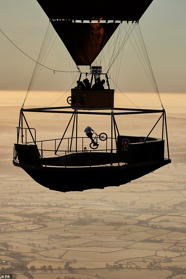 Kyle performs his trick routine on a floating skatepark high above the Cotswolds.