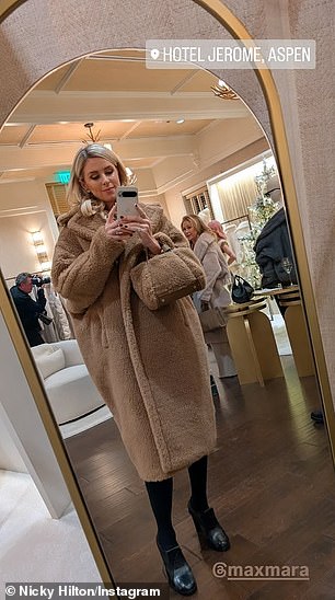 On Wednesday, Rothschild donned an even larger brown teddy coat and matching bag from Max Mara while visiting the Jerome Hotel.