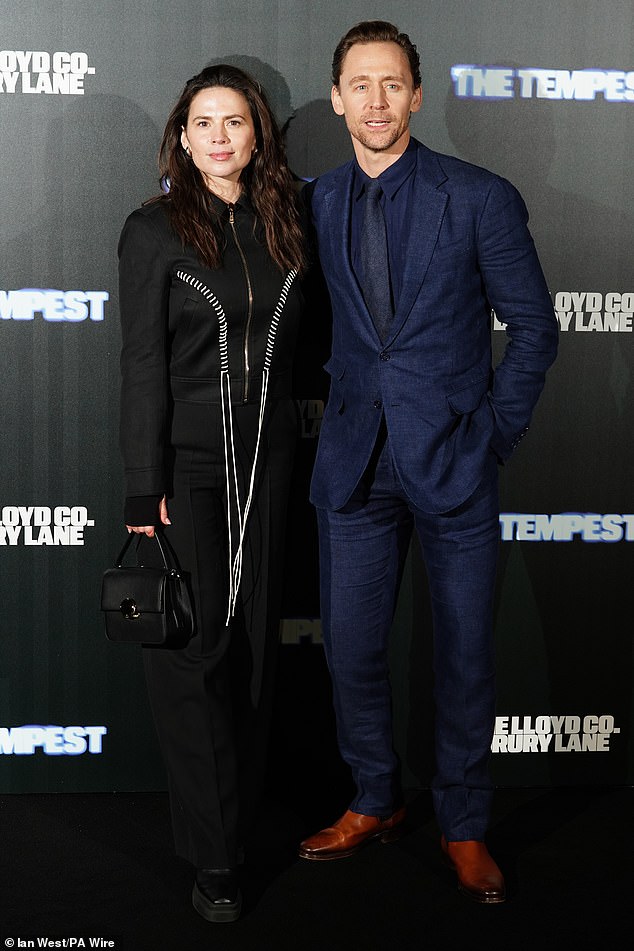 Meanwhile, her co-star Tom, 43, looked in high spirits as he posed up a storm on the carpet alongside Hayley.