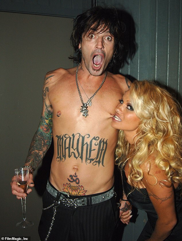 Furlan only shared showers with the musician 'once a week'; Tommy photographed with his ex-wife Pamela Anderson in 2005