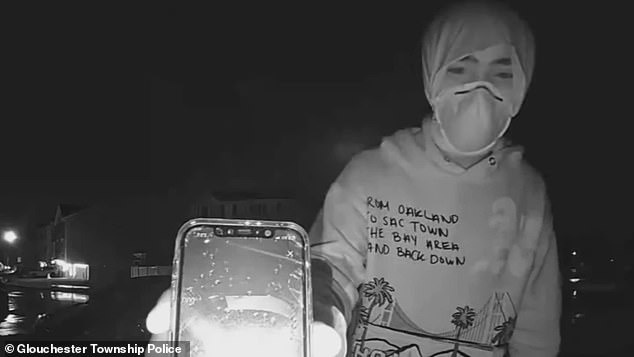 Just two days after the brazen robbery, a lone pirate returned to the scene under the cover of night (and wearing a mask and hoodie) to complain about the scandalous images the victim posted online.