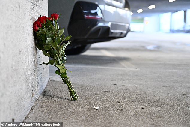 Flowers are left in the garage where Gabor tragically died