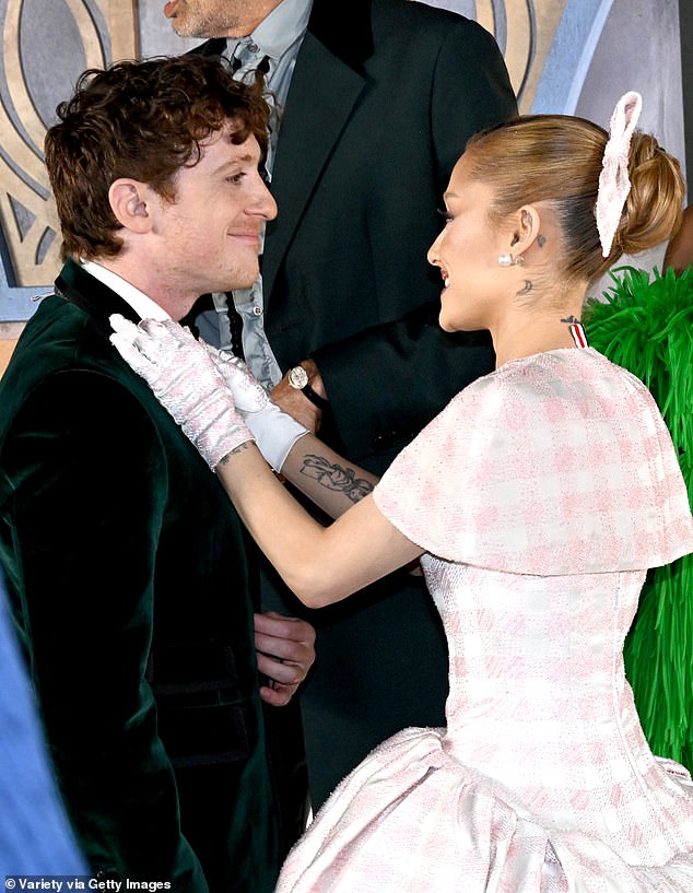 Ariana and Ethan at the Wicked Los Angeles premiere, where the singer pampered her boyfriend on the red carpet