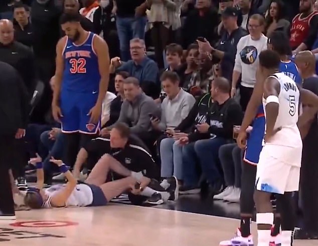 Knicks star Karl-Antony Towns stood next to one of the women as security dragged them away.