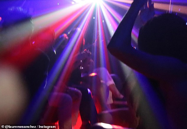 She also shared a photo of the glowing lights at a club as she and her friends partied the night away