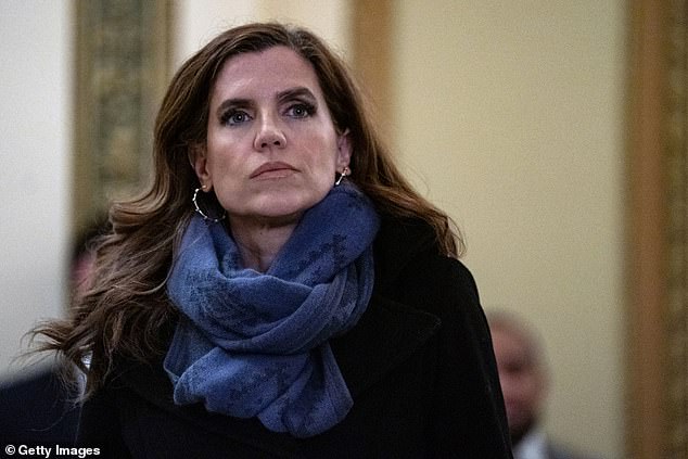 Nancy Mace (R-SC) looks on as other members of Congress do television interviews at the U.S. Capitol on January 18, 2024 in Washington