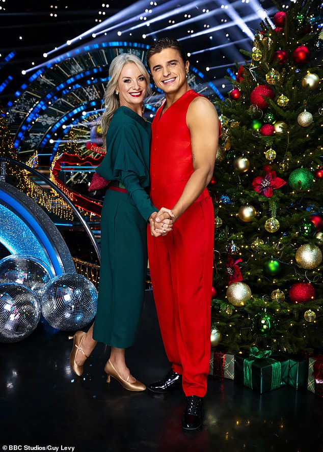 In her partner's photo, Tamzin Outhwaite looked festive in a green dress and gold shoes, while her partner Nikita Kuzmin wore an all-red ensemble.