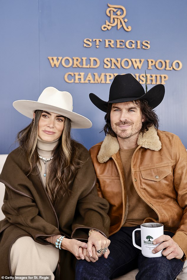 Nikki Reed and Ian Somerhalder dressed like modern cowboys