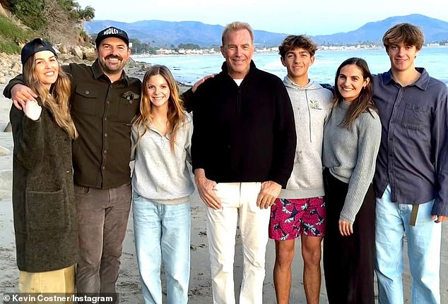 On Monday, Kevin Costner shared a rare photo of himself posing with six of his seven children on a beach after the Thanksgiving holiday.