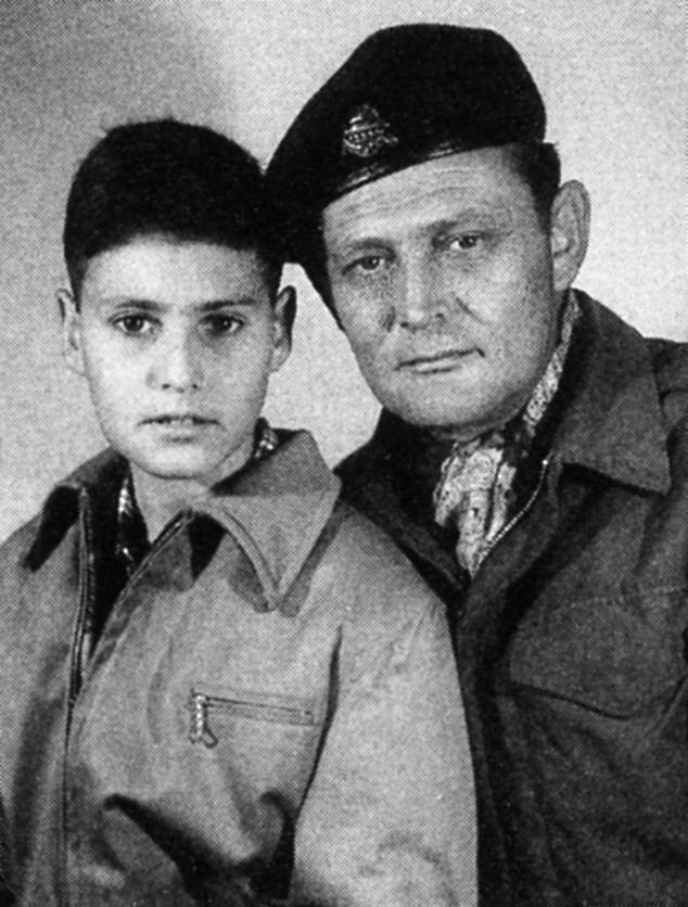 Uri, 11 years old, with his father, Tibor. Uri explored the once war-torn corners of Tel Aviv while growing up, before a discovery that changed his life.