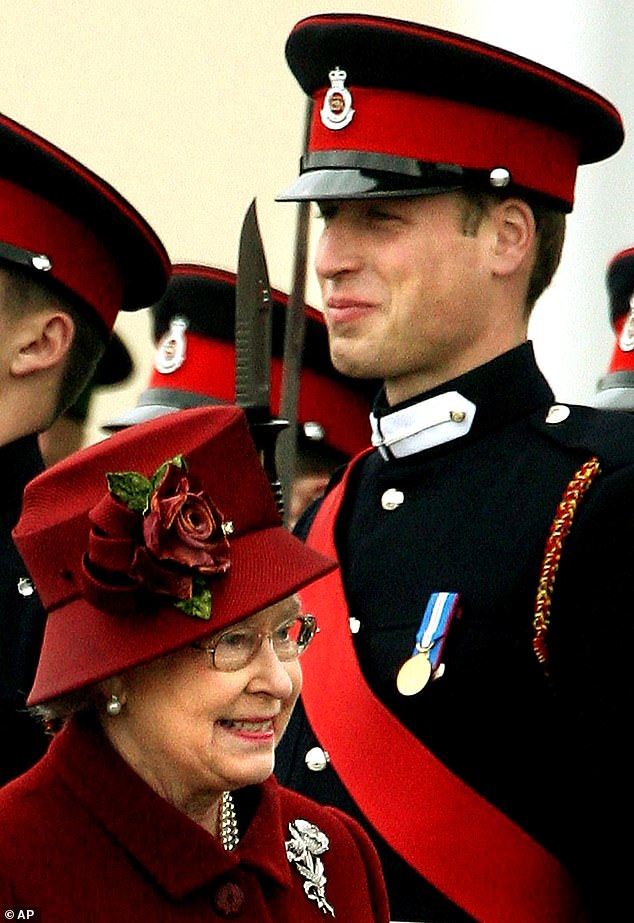 Queen Elizabeth II walks past her grandson, Prince William, as she inspects graduates during a passing out parade at the Royal Military Academy Sandhurst on December 15, 2006.