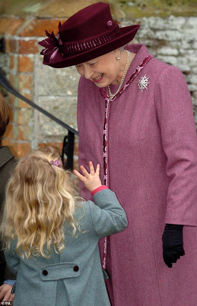 Queen Elizabeth II smiles at her great-niece, four-year-old Margaret Armstrong-Jones, in 2006.