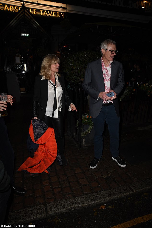 Jeremy Vine and Rachel Johnson left the event at the same time, with Rachel wearing a silky white shirt and black jacket.