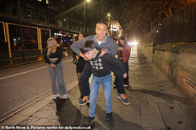 NEWCASTLE: Man gets into the Christmas spirit with his friend on his back