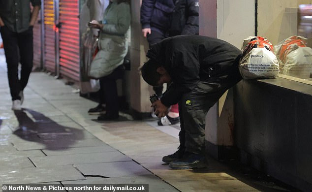 NEWCASTLE: It was all too much for one reveler, who looks at the ground while clutching what looks like a can of beer.