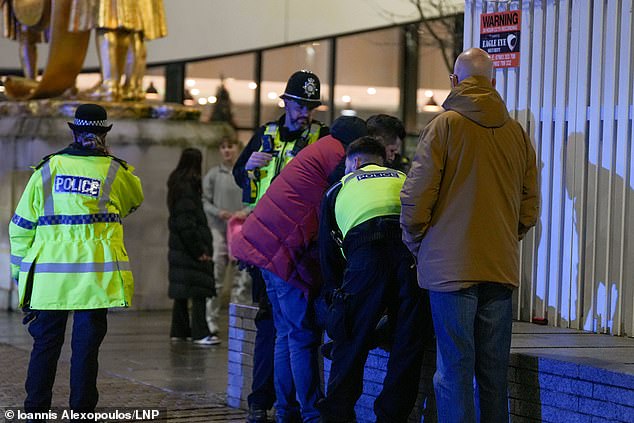 BIRMINGHAM: Police detail reveler in Birmingham city center