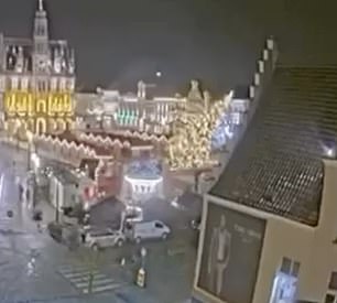 The tree can be seen next to a carousel that falls on the historic town square