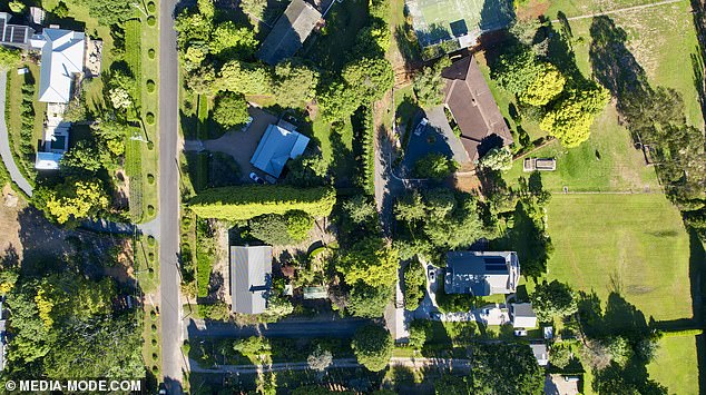 Sam's new cabin (below left) is a quaint house on a quiet street surrounded by a few neighboring properties.