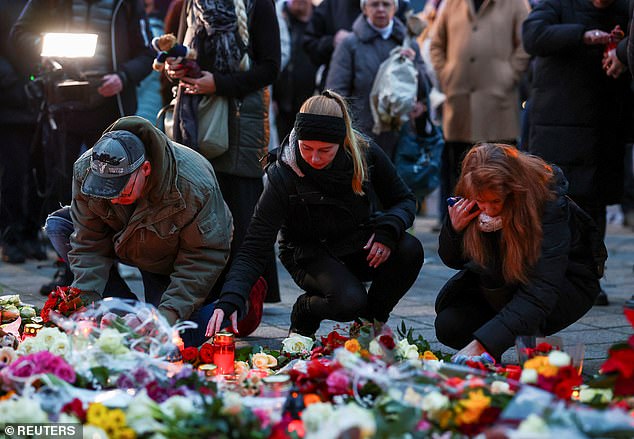 The country is in mourning after Friday's attack, with locals placing candles and tributes at the site where a car plowed into a crowd