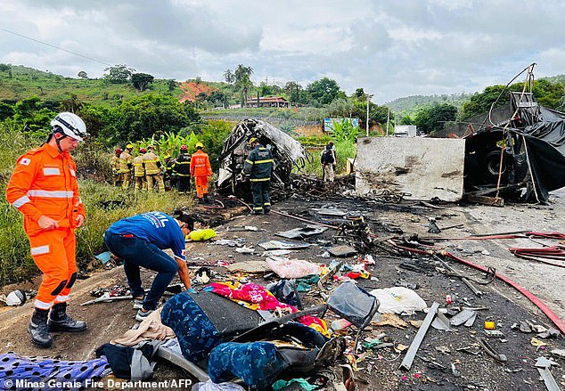 Released photo released by the Minas Gerais Fire Department shows firefighters and other rescue teams working at the scene of the accident