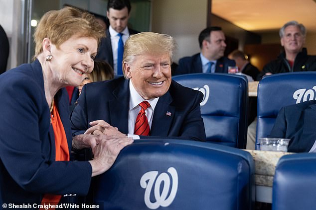 President Donald J. Trump poses for a photo with Rep. Kay Granger of Texas while attending Game 5 of the MLB World Series between the Washington Nationals and the Houston Astros